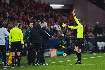 Referee Francois Letexier shows the red card to Head Coach Jose Mourinho of SL Benfica during the UEFA Champions League 2025/26 Play-offs First Leg match between SL Benfica and Real Madrid CF at Estadio da Luz. Final score: SL Benfica 0 - 1 Real Madrid FC.