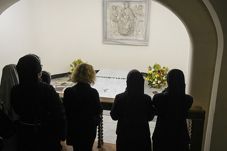Faithful visit the tomb of late Pope Emeritus Benedict XVI inside the grottos of St. Peter's Basilica in Vatican. Pope Emeritus Benedict XVI died at the age of 95 on December 31 in the Mater Ecclesiae monastery in Vatican City, where he had spent the last ten years.