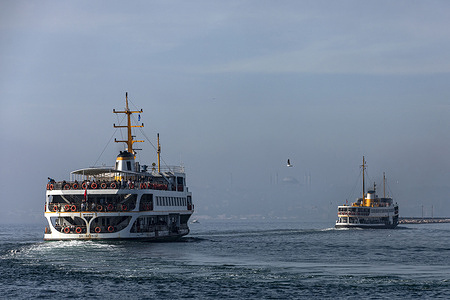 The city line ferries sail towards the Kadikoy Pier.