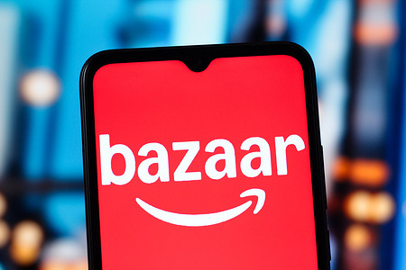 In this photo illustration, the Amazon Bazaar logo is seen displayed on a smartphone screen.