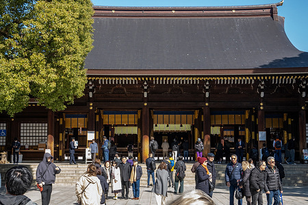 Visitors walk toward the main entrance gate at Meiji Jingu Shrine. Meiji Jingu is a Shinto shrine in Tokyo dedicated to Emperor Meiji and Empress Shoken, set within a large forested park that feels worlds away from the city. Known for its massive torii gates and peaceful walking paths, it’s one of Tokyo’s most important spiritual sites and a popular place for traditional ceremonies and New Year visits.