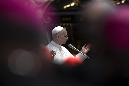 Pope Leo XIV gives his blessing at the end of a meditation with the bishops on the occasion of their Jubilee in St. Peter's Basilica.