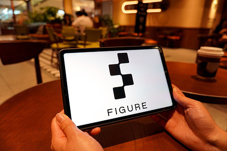 In this photo illustration, the Figure logo is displayed on the screen of a smart tablet.