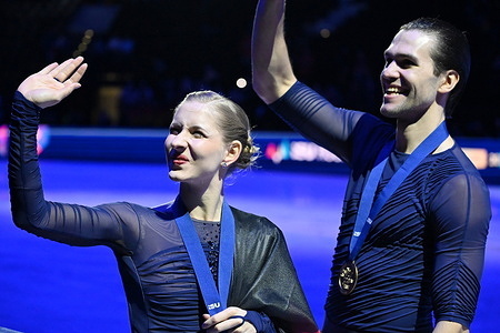 (L-R) Gold medalists Minerva Fabienne Hase and Nikita Volodin of Germany celebrate during the medal ceremony for the Pairs competition at the ISU Figure Skating World Championships 2026 at the O2 Arena. ISU Figure Skating World Championships 2026 takes place from 24th to 29th of March in Prague, Czech Republic.