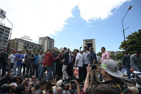 Juan Guaidó seen being welcomed at the protest. 
Interim President Juan Guaidó, was at a protest where private and public workers of the transport sector, decided to support him instead of Nicolas Maduro, Caracas.