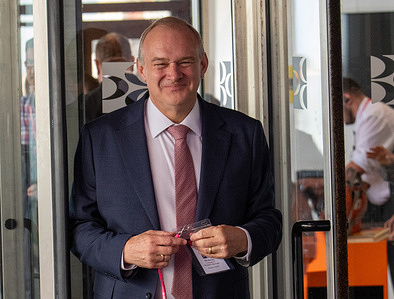 Liberal Democrat leader Sir Ed Davey arrives at a conference centre holding his priority pass. Liberal Democrat leader Sir Ed Davey arrives at the conference centre holding his priority pass. He addressed party delegates during a headline session at the Liberal Democrats Autumn Conference held at the seaside Brighton Centre on King’s Road. This year's four-day political summit featured designated focus events including a Climate Change Day alongside a Youth and Skills Day.