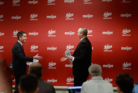 Indiana University Basketball coach Darian DeVries (R) who was hired this week shakes hands with Scott Dolson (L) at his opening press conference.