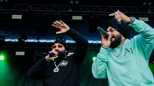 Chani Nattan (L) and Inderpal Moga (R) open for Jazzy B at K-Days music fest at Edmonton Expo Centre and Fairgrounds.