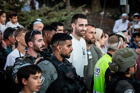 Released hostage Avinatan Or looks on as he arrives at his home at the West Bank settlement of Shilo. Dozens of Israelis gathered in the settlement of Shilo to welcome home former hostage Avinatan Or, who was freed last week after nearly two years in Hamas captivity. Or, abducted from the Nova music festival during the Oct. 7, 2023, attack, was discharged from hospital earlier today. Footage showing militants separating him from his girlfriend, Noa Argamani, who was also taken hostage, became one of the enduring symbols of the assault.