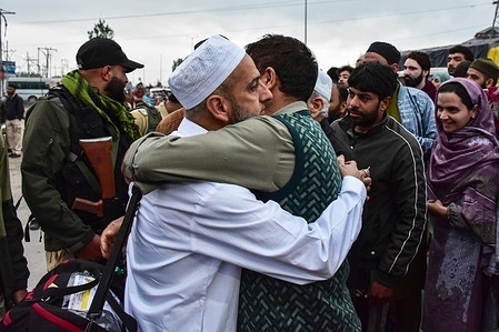 A Kashmiri Muslim pilgrim gives a farewell hug to his relative as he departs from Srinagar for the annual Hajj pilgrimage to the holy city of Mecca in Saudi Arabia. The first batch of pilgrims from Srinagar departed for Madinah, Saudi Arabia, to perform the annual Hajj. This year, a total of 3,600 pilgrims from Jammu and Kashmir will undertake the holy journey to Mecca and Madinah.