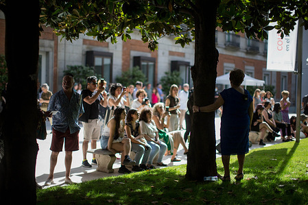 An elderly woman sings while touching a tree in the garden of the Museo Nacional Thyssen-Bornemisza. The Museum in Madrid carries out a program of performances entitled "Vision and presence", where women artists of different nationalities perform around different themes such as the invisibility of female artists in the art world, gender violence, romantic love or the aging of modern societies.