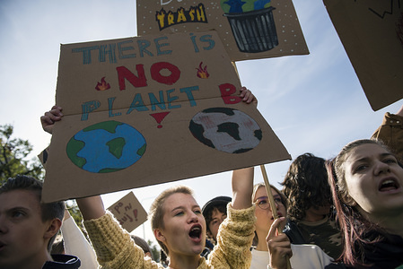Protesters shout slogans while holding placards during the climate change strike in Warsaw.
Thousands of kids, pupils and students took part in a march in Warsaw - organised by Mlodziezowy Strajk Klimatyczny (Youth Strike for Climate) - which is part of the global protests against climate change. Protesters demand action from politicians in the matter of global warming, air and earth pollution.