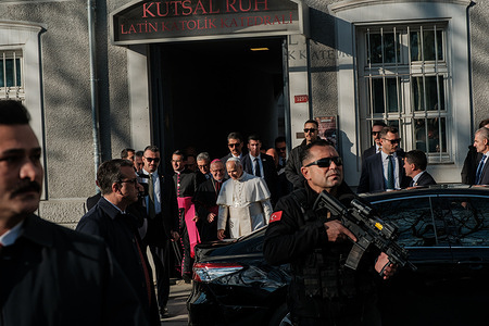 Pope Leo XIV leaves the Cathedral of the Holy Spirit. Pope Leo XIV, Head of the Vatican State met with bishops, priests, deacons, and other clergy at the Holy Spirit Catholic Church (Saint Esprit Cathedral) in Harbiye as part of his visit.