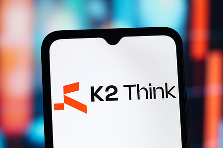 In this photo illustration, the K2 Think logo, an open-source Emirates artificial intelligence (AI) reasoning model is seen displayed on a smartphone screen.