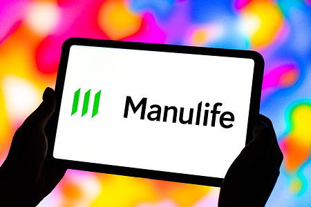 In this photo illustration, the logo of Manulife Financial Corporation is displayed on the screen of the tablet.