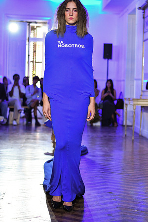 A model walks the runway wearing a design by E.R.A.X. during Mercedes-Benz Fashion Week in IFERMA.