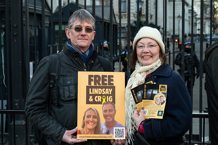 Supporters of Lindsay and Craig Foreman hold placards outside Downing Street during the demonstration. Family members and supporters of Lindsay and Craig Foreman gathered outside Downing Street to protest what they described as their unjust detention, calling on the UK government to intervene and secure their release. Holding placards and photographs, demonstrators appealed for diplomatic action.