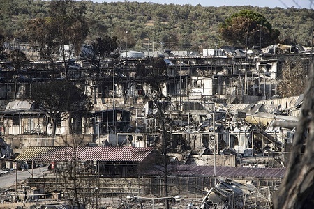 Aftermath of a massive fire that destroyed the official Moria Refugee camp facilities.
Aftermath of the fire at the largest refugee camp in Europe, Moria Refugee Camp in Lesbos Island in Greece. The camp was burned on September 9 from 6 accused Afghans. It hosted the official facility and the makeshift camp around the olive groves almost 13.000 people that were transferred to the temporary New Camp in Kara Tepe in the same island. Almost all the Asylum seekers have been registered in the new camp that has tents, water, food, toilets etc.