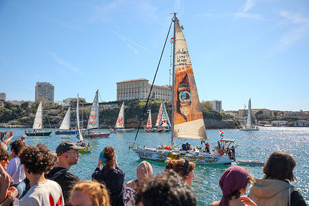 View of the flotilla passing in front of the port of Marseille to greet their supporters before heading towards Gaza. The "Thousand Madleens" flotilla, composed of eighteen French boats, left the port of Marseille, to join an international flotilla of about one hundred vessels. Its objective: to defy Israel's illegal blockade and deliver humanitarian aid to Gaza.