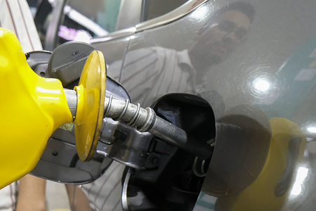 A man seen holding the petrol nozzle at a Petronas oil and gas station at Kuala Lumpur.

National Petroleum Limited or known as Petronas is a Malaysian oil and gas company founded on 17 August 1974 and its owned by the Malaysia government.
