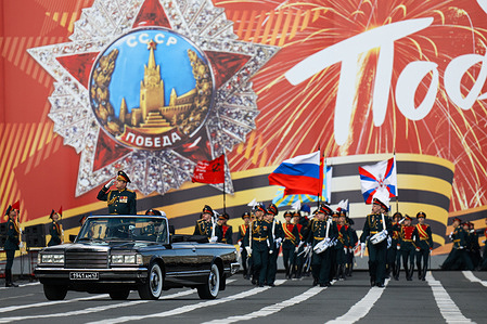 A black open-top car carrying military officials drives past the festive grandstands during a rehearsal for the 81st Victory Day Parade on Palace Square. The rehearsal of parade units on foot took place on Palace Square in St. Petersburg in preparation for the 81st anniversary of Victory in the Great Patriotic War. Units of the Leningrad Military District, cadets from military academies, and representatives of law enforcement agencies participated in the training. The specialists practiced their marching skills and drill techniques accompanied by a combined military orchestra. On May 9, 1945 (Moscow time), the Act of Unconditional Surrender of Germany came into force. For city residents, this date is inextricably linked with the heroism of the Leningraders who survived the siege.