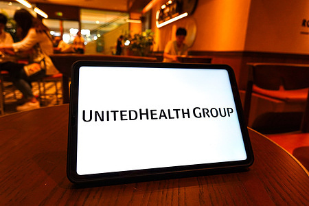 In this photo illustration, the UnitedHealth Group logo is displayed on the screen of the tablet.