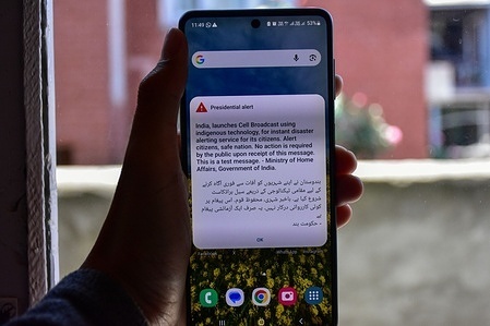 A message pops up on the phone screen during a drill following the launch of an emergency messaging system. India has launched its Cell Broadcast messaging system using indigenous technology for instant disaster alerting service for its citizens. Millions of mobile phones across India buzzed for several seconds as part of a government trial of a mobile-based disaster alert system.