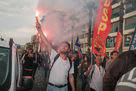 A protester holds a burning torch during the demonstration. On the 12th anniversary of the 2013 Gezi Park protests, left-wing university students organized a march. On May 31st of 2013, the government intervened in the Gezi Park in Taksim Square in Istanbul and wanted to demolish it. However, there was a massive anti-government uprising. People have died in police crackdowns. The protests spread almost all over Turkey. Until June 16, the protests continued unabated. This was a very important turning point in recent Turkish history. It was a reaction to the system in Turkey rather than the cutting down of trees in the park. For this reason, every May 31st people organize protests to commemorate the Gezi Park protests.