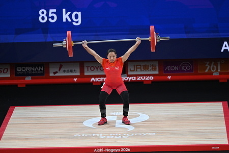 Mirabai Chanu seen during the women’s 49kg weightlifting event at the Aichi-Nagoya Asian Games 2026. She lifted 87kg in the snatch and 111kg in the clean & jerk, for a total of 198kg.