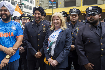 New York City Police department (NYPD) Commissioner Jessica Tisch poses with NYPD officers at the 43rd India Day Parade on Madison Avenue on August 17, 2025 in New York City. The colorful celebration honored India's Independence Day while showcasing culture, folklore, and traditions with vibrant displays and community participation.