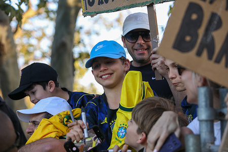Brazil supporters await the players to sign autographs after their training session in Brisbane. Brazil will play the Australian Socceroos in their second match Tuesday, 29th September at Suncorp Stadium.
