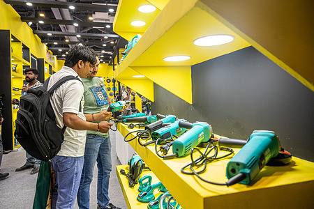 Two visitors examining a drill displayed by Akari India Private Limited, an Indian manufacturing company during the Tools and Equipment Expo 2026 at Bharat Mandapam. Tools and Equipment Expo 2026 is a leading B2B platform in India that brings together manufacturers, innovators, and distributors from the fields of tools, machinery, and cutting and welding equipment. The event is designed for professionals from the construction, manufacturing, and fabrication industries. It provides an opportunity to discover new suppliers, explore investment opportunities, connect with industry experts and key decision-makers, and learn about emerging industry trends.