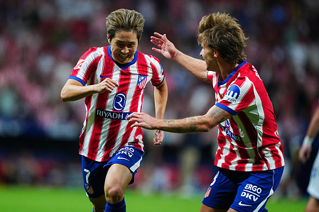 Lee Kang-In and Pablo Barrios of Atletico Madrid seen celebrating during the LaLiga EA Sports match between Atletico Madrid and Malaga CF at Metropolitano Stadium . Final Score; Atletico Madrid 2:0 Malaga CF.