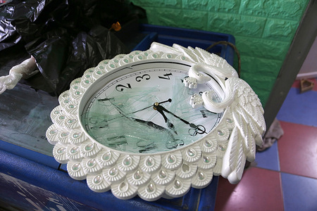 A damaged clock seen at the Madeed Charitable Society in Nablus, in the West Bank. Israeli forces shut down the Madeed charity organization in Nablus during a military raid, citing allegations that it was providing services to an illegal organization. According to local sources, soldiers searched the offices, confiscated money, computers, and documents, and posted a military order closing the group. The organization provides support to orphans, low-income Palestinians, and people with disabilities. The raid came amid broader Israeli military operations and increasing violence across the occupied West Bank, where raids, arrests, and attacks on Palestinian communities have intensified since October 2023.