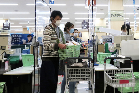People shopping while wearing face masks as a preventive measure at the Shinjyuku shopping area during the Coronavirus (COVID-19) lockdown crisis.
Department stores in the major cities of Tokyo closed down and malls look almost deserted due to Coronavirus (COVID-19) pandemic.