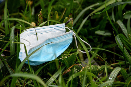 Discarded face mask lies on the ground.More than a year since the Covid-19 pandemic begun, people continue to throw masks anywhere.