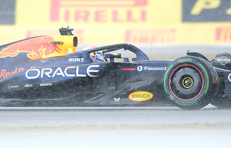 Max Verstappen of Oracle Red Bull Racing F1 Team seen driving in heavy rain during the Formula One British Grand Prix at Silverstone.