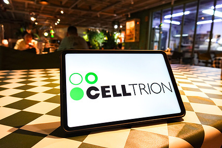 In this photo illustration, the Celltrion logo seen displayed on a screen of the tablet.
