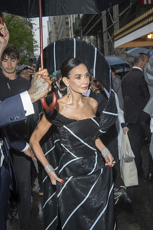 New York, United States - 05/05/2025 17:29:14: Demi Moore wearing Thom Browne departs the Pierre Hotel for 2025 Met Gala in New York City.
