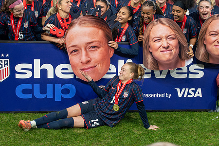 Emily Sonnett (14) of the United States poses with a cardboard cutout of her own likeness while celebrating with teammates after defeating Colombia to win the 2026 SheBelieves Cup at Sports Illustrated Stadium in Harrison. The United States Women's National Team celebrates winning the 2026 SheBelieves Cup at Sports Illustrated Stadium. The USWNT defeated Colombia 1–0 to secure their eighth tournament title.
