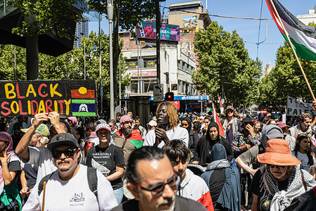 Protesters march on the street during the demonstration. An anti-genocide rally, beginning at the State Library and concluding at Flinders Street, called for an arms embargo and divestment from the arms industry. Organized by Sawt Alsudan and Free Palestine groups, the rally condemns foreign-backed violence in Sudan and Palestine and urges an end to Australia’s arms deals.