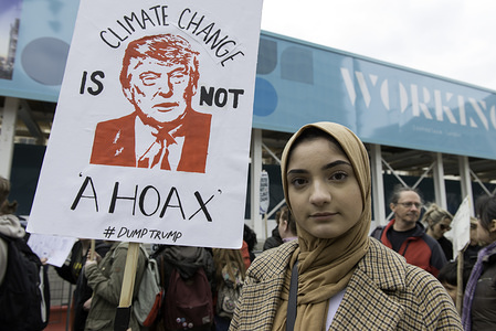 A student is seen holding a placard reading “Climate change is not a hoax” at the Climate strike in London.

Students gathered in Parliament Square and marched through central London joining the Global Climate Strike and demanding from the government and politicians direct actions to tackle the climate change.