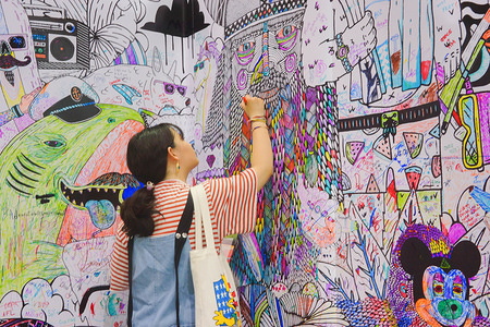 A woman seen at the part of audience engagement with the wall art during the fair.
The Other Art Fair is one of the art fairs in Sydney, discovering talented and emerging artists' work. It provides a platform for art lovers and collectors to buy and meet the artists. The Other Art Fair is presented by Saatchi Art.