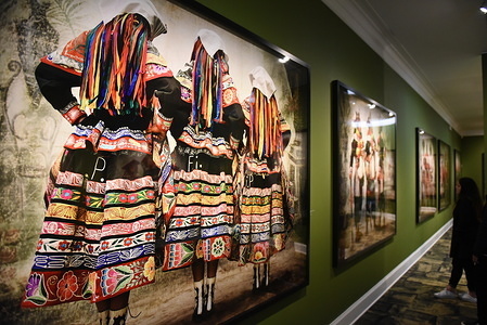 A picture of villagers dressed in traditional costumes at the Mate museum during the exhibition in Lima.
Mario Testino exhibition "Alta Moda" is the result of a five-year project that investigates both Peruvian traditions and the history of photography at the Mate museum in Lima.