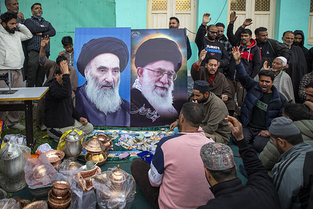 Kashmiri Shiite Muslims shout pro-Iran slogans as they conduct a donation drive for war-torn Iran, on the outskirts of Srinagar. Muslims, predominantly from the Shia community, across Indian administered Kashmir and Ladakh have contributed cash and valuables, including gold, silver jewellery, copper and household items, in a large scale donation drive to support the reconstruction of damaged infrastructure in Iran amid ongoing U.S. and Israeli strikes in the Middle East, with collections intensifying during Eid-al-Fitr and carried out through mosque networks, community volunteers and local collection centres, while the items are being converted into cash and routed through authorised channels despite logistical challenges, reflecting strong public participation and expressions of solidarity, including protests in parts of the region as conflict in West Asia escalates.