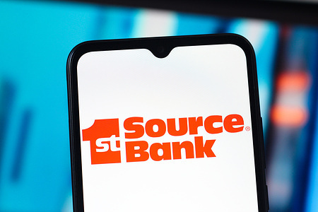 In this photo illustration, the 1st Source Bank logo is seen displayed on a smartphone screen.