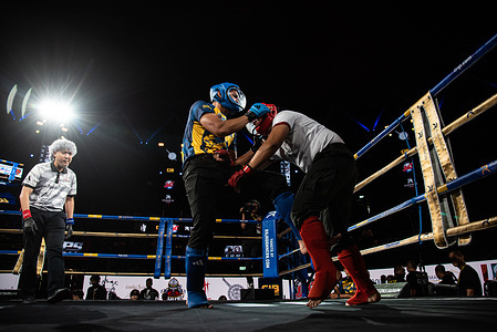 Thai police officers participate in the Cops Combat competition at Rajadamnern Stadium.