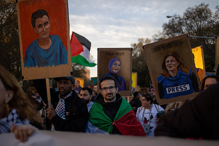 Protesters hold placards depicting victims of Israeli attacks during its siege of Gaza during the unified demonstration commemorating Palestinian Land Day. Land Day (March 30) commemorates the 1976 general strike against land confiscation in Galilee and the killing of six protesters. It symbolizes the resistance, unity, and connection of the Palestinian people to their land, and will mark its 50th anniversary in 2026.