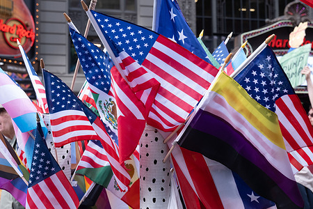 Flags being sold by a vendor for the protest. Thousands march in New York City as part of a massive nationwide protest against President Donald Trump and his administration. The second “No Kings” action this year, it’s message is clear “this country does not belong to kings, dictators, or tyrants. It belongs to We the People”.