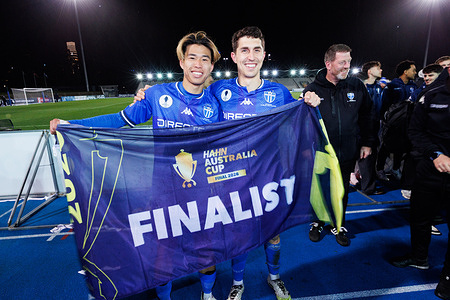 Yuki Uchida (L) and Maximillian Mikkola of South Melbourne FC (R) celebrate after the Hahn Australia Cup Semi Final match between South Melbourne FC and Lions FC at Lakeside Stadium. Final score: South Melbourne FC 3 :1 Lions FC.
